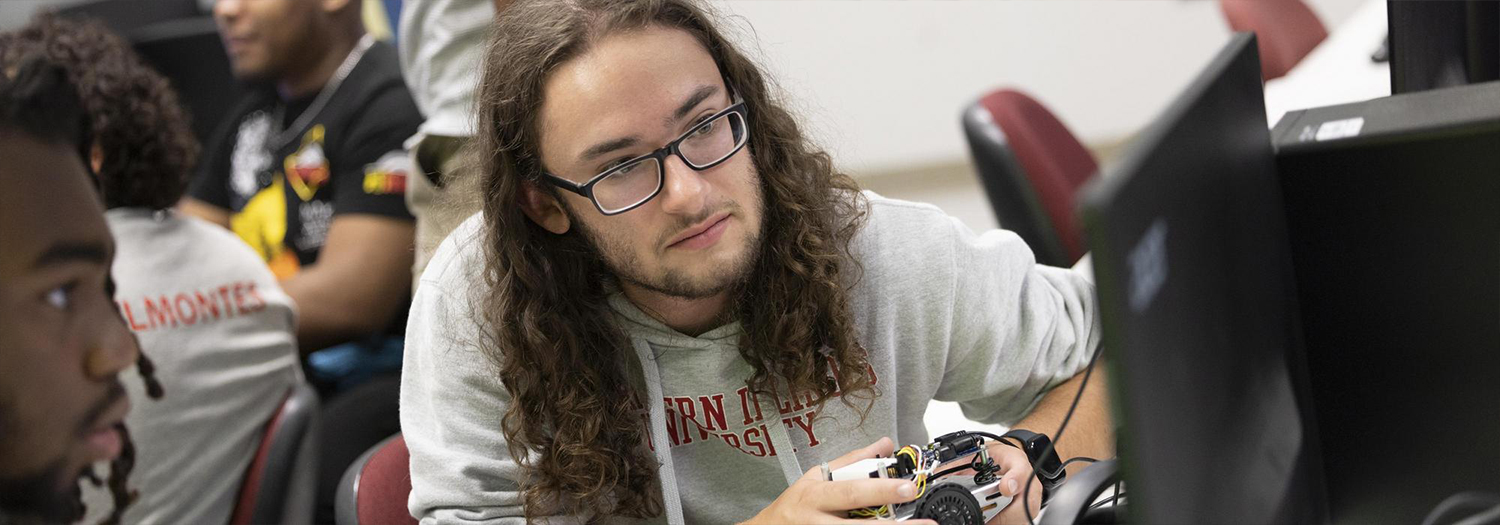 Students in a College of Engineering and Engineering Technology Lab